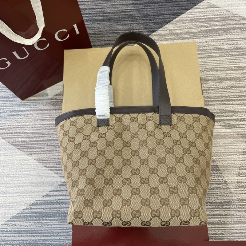 G*u*i shopping bags